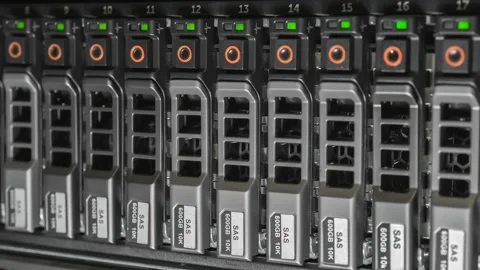 Storage server with many HDD disks inside rack in server room Video stock 169764543