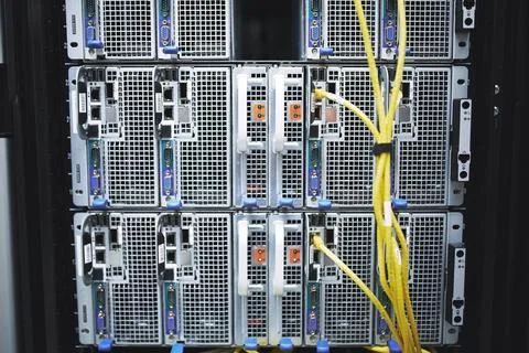 Storage, servers and cables in empty data center for cybersecurity, IT hard.. Stock Photos