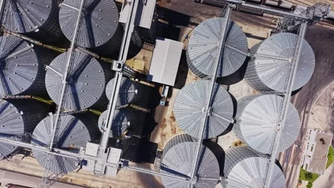 Storage silos and train tracks seen from above during daylight Stock Footage 341328365