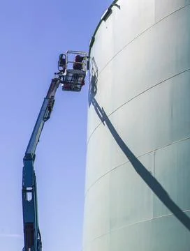 Storage tank work in refinery Stock Photos
