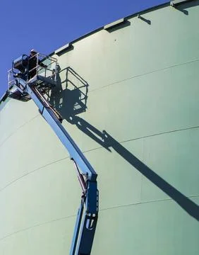 Storage tank work in refinery Stock Photos