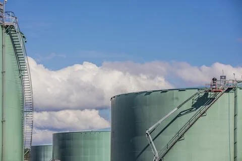 Storage tank work in refinery Stock Photos