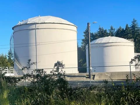 Storage tanks in the sunshine Stock Photos