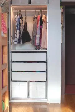 Storage in wardrobe. Stock Photos