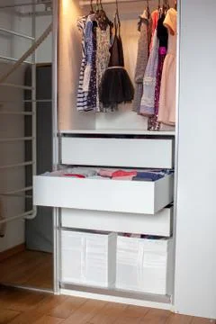 Storage in wardrobe. Stock Photos