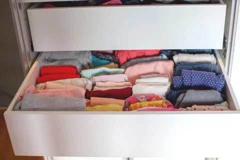 Storage in wardrobe. Stock Photos