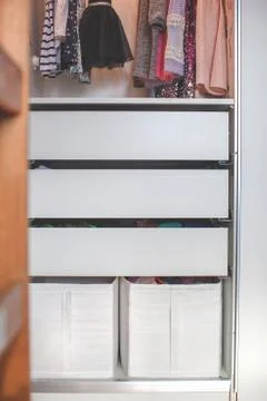 Storage in wardrobe. Stock Photos