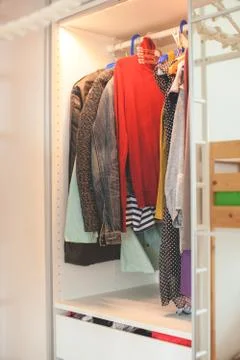 Storage in wardrobe. Stock Photos