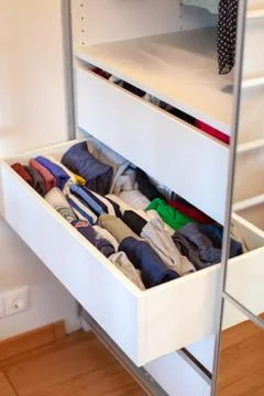 Storage in wardrobe. Stock Photos