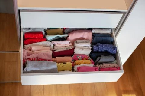 Storage in wardrobe. Stock Photos