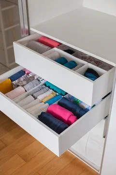Storage in wardrobe. Stock Photos