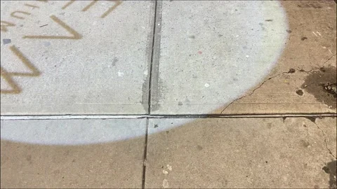 Store Advertisement project on sidewalk, Storefront Marketing - 4K Prores 422 HQ Stock Footage 233905497