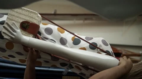 Store assistant working on the clothing store. Vertical video. Stock Footage 141475524