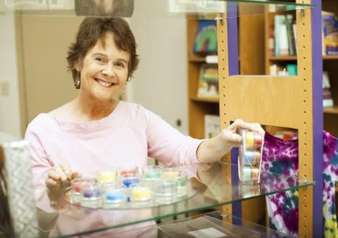 Store Clerk Working Stock Photos