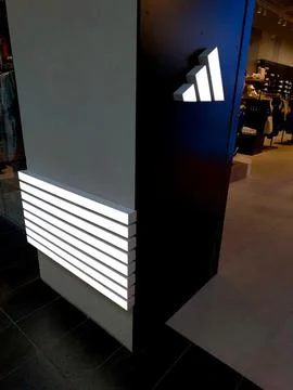 Store Corner Featuring a Branded ADIDAS Logo in a Shopping Mall During Daytim Stock Photos