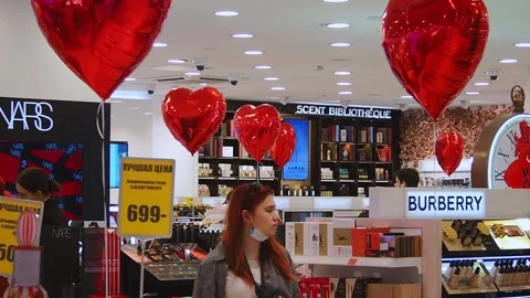 Store decorated for Valentine's Day with red balloons hearts. Stock Footage 170318600