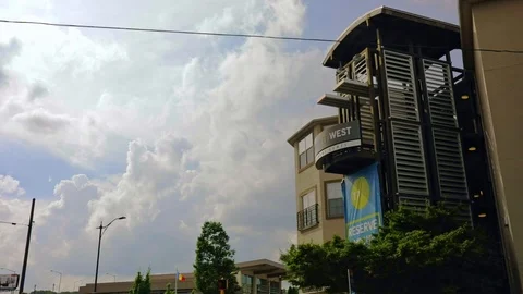 Store front building with cloudy sky fixed 1080p 30fps Stock Footage 90098000