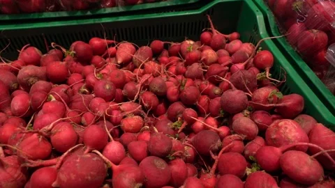 Store shelf with red radishes Stock Footage 167930962
