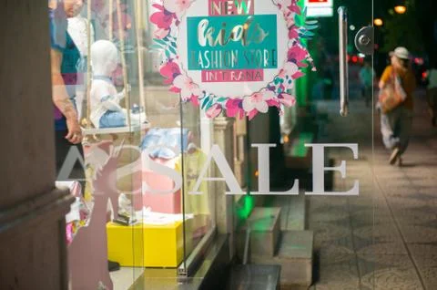 Store showcase window display with text sale. Stock Photos