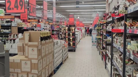 Store view with red prices am people shopping Stock Footage 225898624