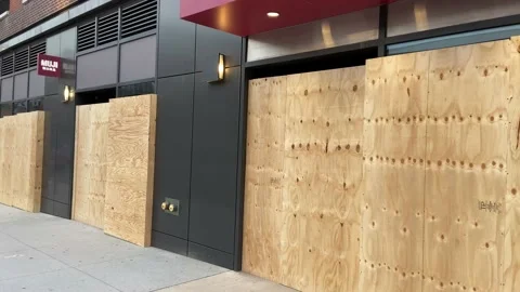 Store windows boarded in NYC during Black Lives Matter riots June 3, 2020 Stock Footage 131795299