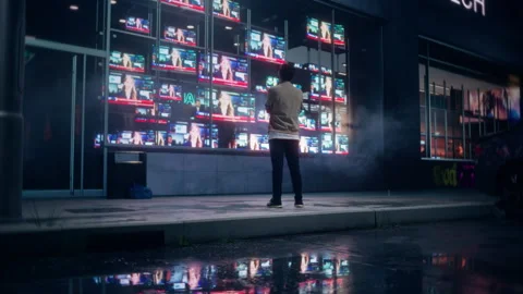 Storefront Television Display with a Man Watching News Vídeo Stock 295353396