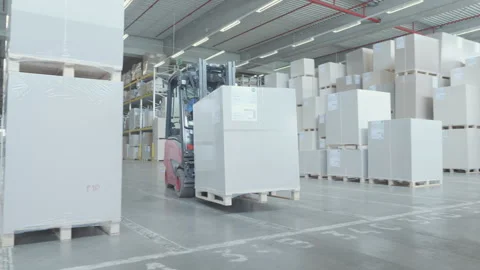Storehouse forklift driver loading goods in cargo truck shipping container Stock Footage 248648005