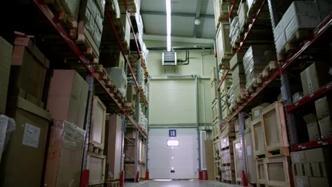 Storehouse with packed consumer commodities on shelves Stock Footage 240406965