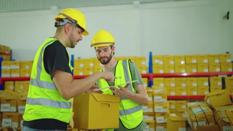 Storehouse Worker working in warehouse retail store industry. Stock Footage 247250557