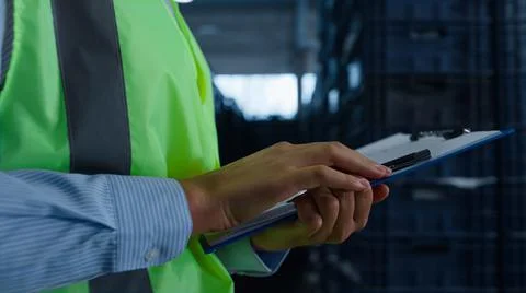 Storekeeper counting boxes checking supply shipping process hands closeup Stock Photos