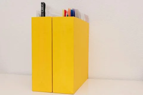 Storing organization system business documents in folders at workplace office Stock Photos