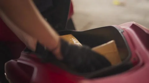 Storing Package Under Motorcycle Seat Stock Footage 344236012