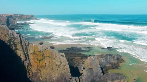 Storks nest on cliffs at the coast of Algarve Portugal aerial view Stock Footage 63782892