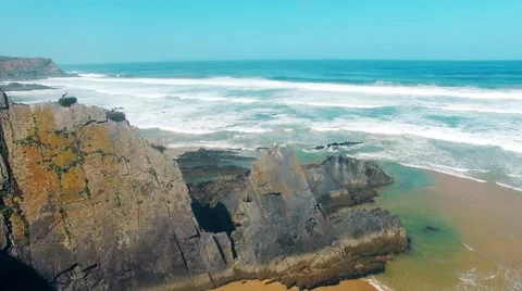 Storks nest on cliffs at the coast of Algarve Portugal aerial view Stock Footage 63782995