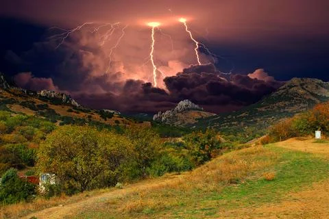 Storm and lightning over te rocks Stock Photos