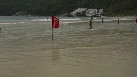 Storm and red flag on the ocean Stock Footage 172423189