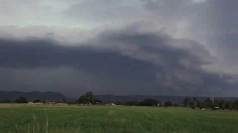 Storm and Shelf Clouds Time Lapse Over Flat Plains and Distant Mountains Stock Footage 40830934