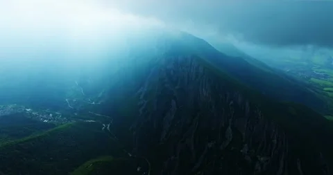 Storm Approaching High Mountain Peak Clouds Sun Rays Aerial Steady Timelapse Stock Footage 300479478