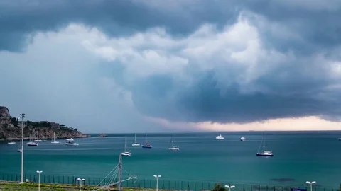 Storm approaching on mediterranean sea in Taormina bay. Timelapse Stock Footage
