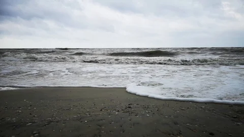 Storm on the beach. Big gray waves and cool weather.  Stock Footage 112164204
