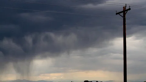 Storm behind a phone line Stock Footage 78958098