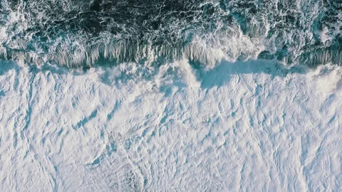 Storm on a black beach, top view drone. Real time Stock Footage 114440054