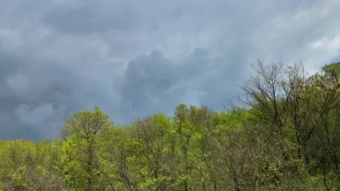 Before storm blue sky with white clouds and dark sky with dark clouds Stock Footage 239402673