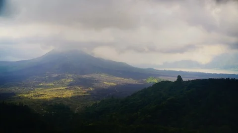 A storm is brewing over the volcano Mount Agung in Bali, timelapse Stock Footage 124996917