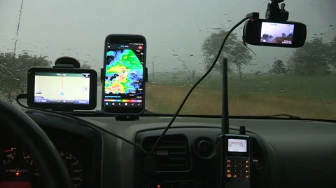 Storm chaser caught in severe thunder and rain storm Stock Footage 64896013