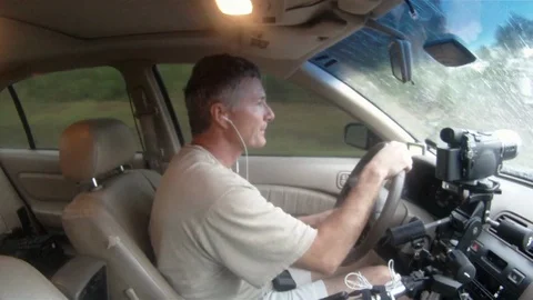 Storm Chaser driving to outflank a tornado Stock-Footage 99832620