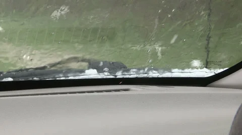 Storm chaser in hail storm Stock Footage 38527991