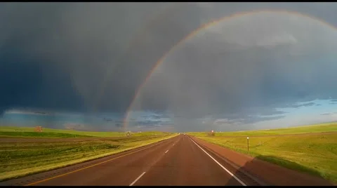 Storm Chaser Time Lapse Trying to Catch Giant Rainbow Stock Footage 54716333
