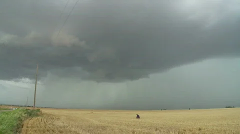 Storm chaser under a Supercell Thunderstorm Stock Footage 362029