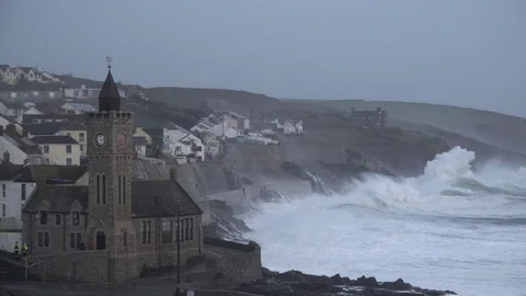 Storm Ciara causes huge waves to crash into the cliffs of the Cornish Stock Footage 124667800